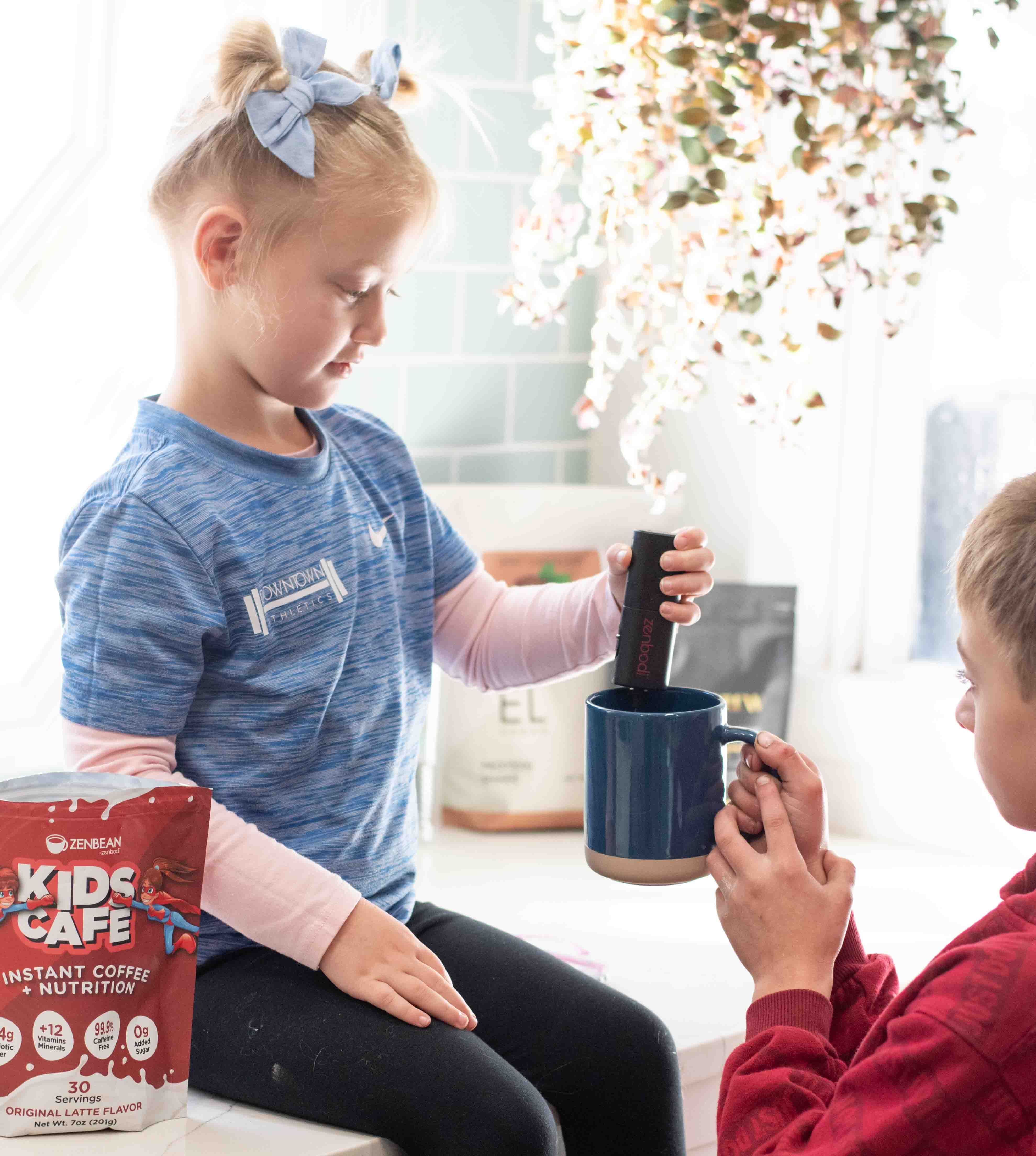 Girl stirring Kids Cafe latte